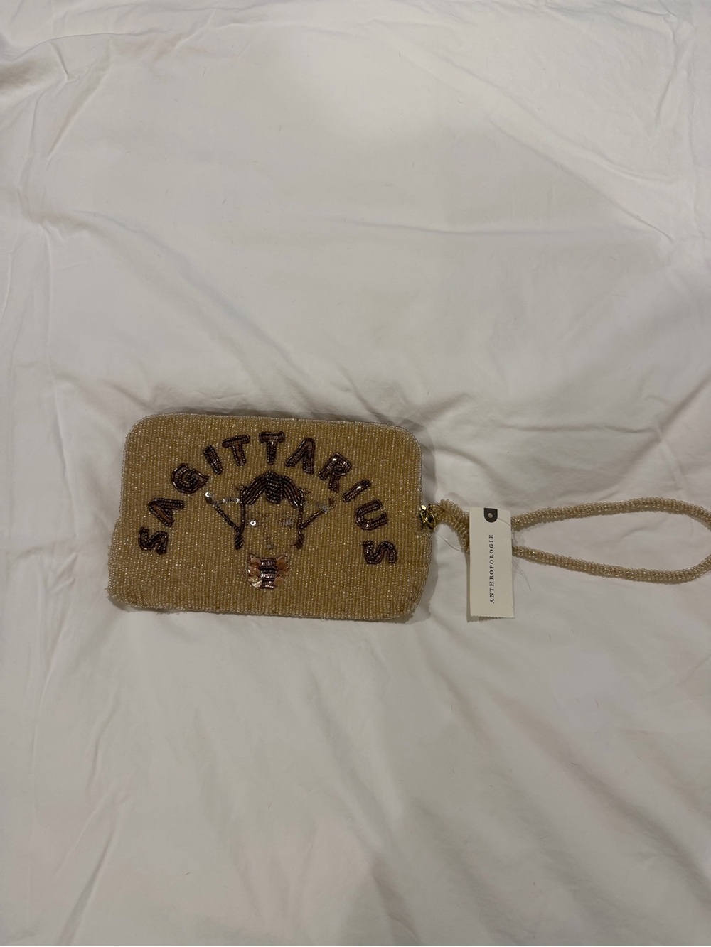 Anthropologie Beaded Sagittarius Wristlet Clutch in Gold with Dark Brown Accents